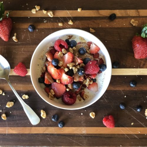 Superfood Breakfast Cereal Bowl with Mixed Berries
