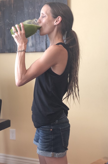 Drinking a green smoothie