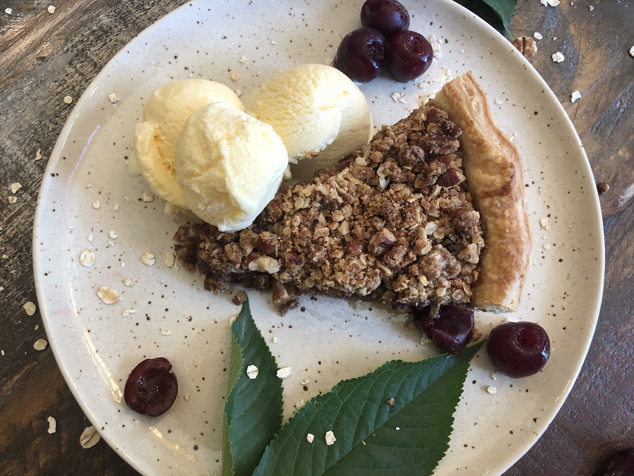 Fresh Cherry Pecan Crumb Pie with vanilla ice cream