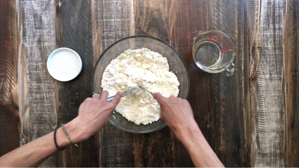 Cutting butter into flour for simple homemade pie crust